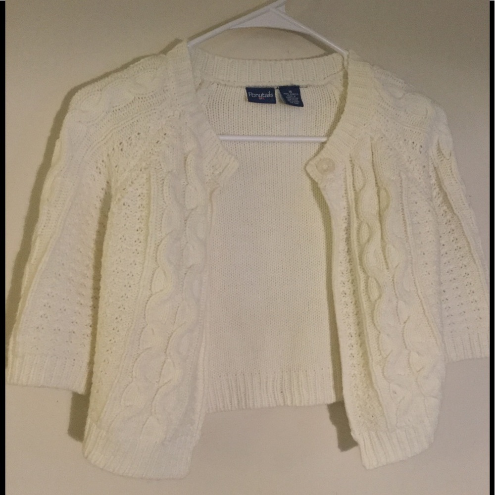 Ponytails cable knit shrug